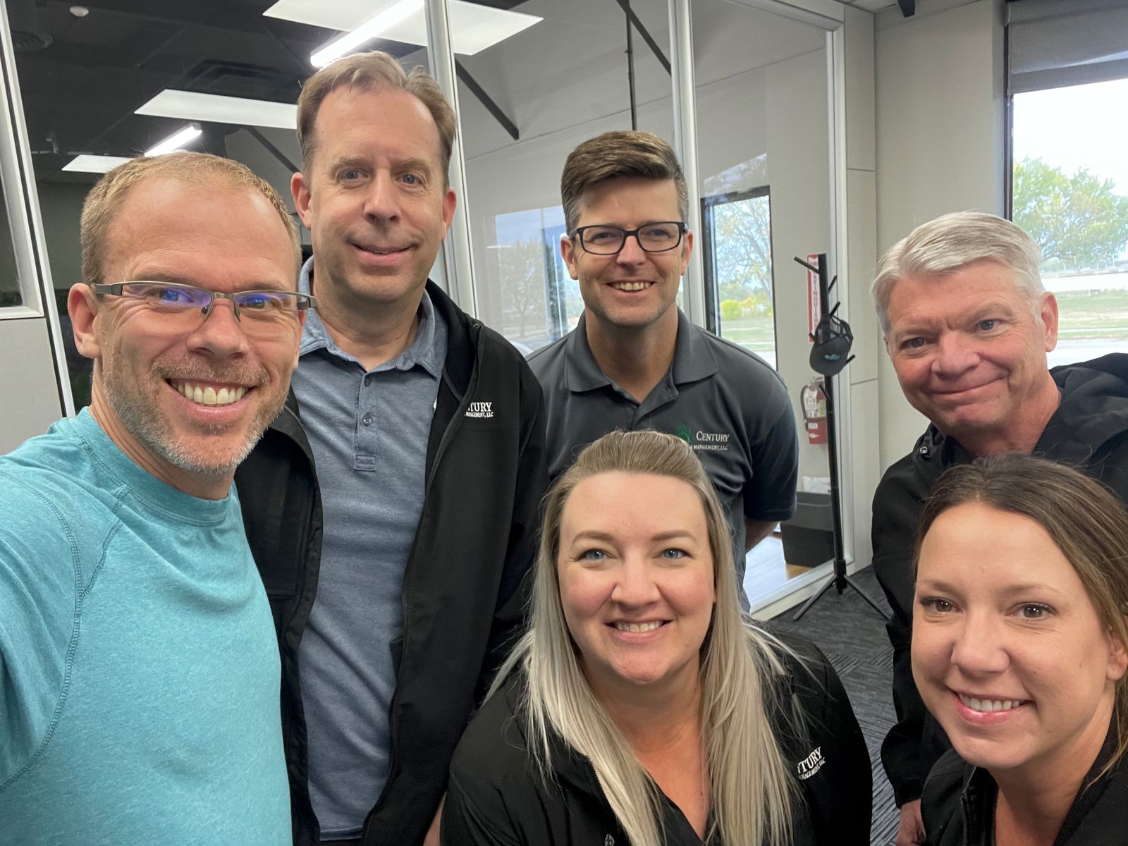 Scott with a client leadership team in their office